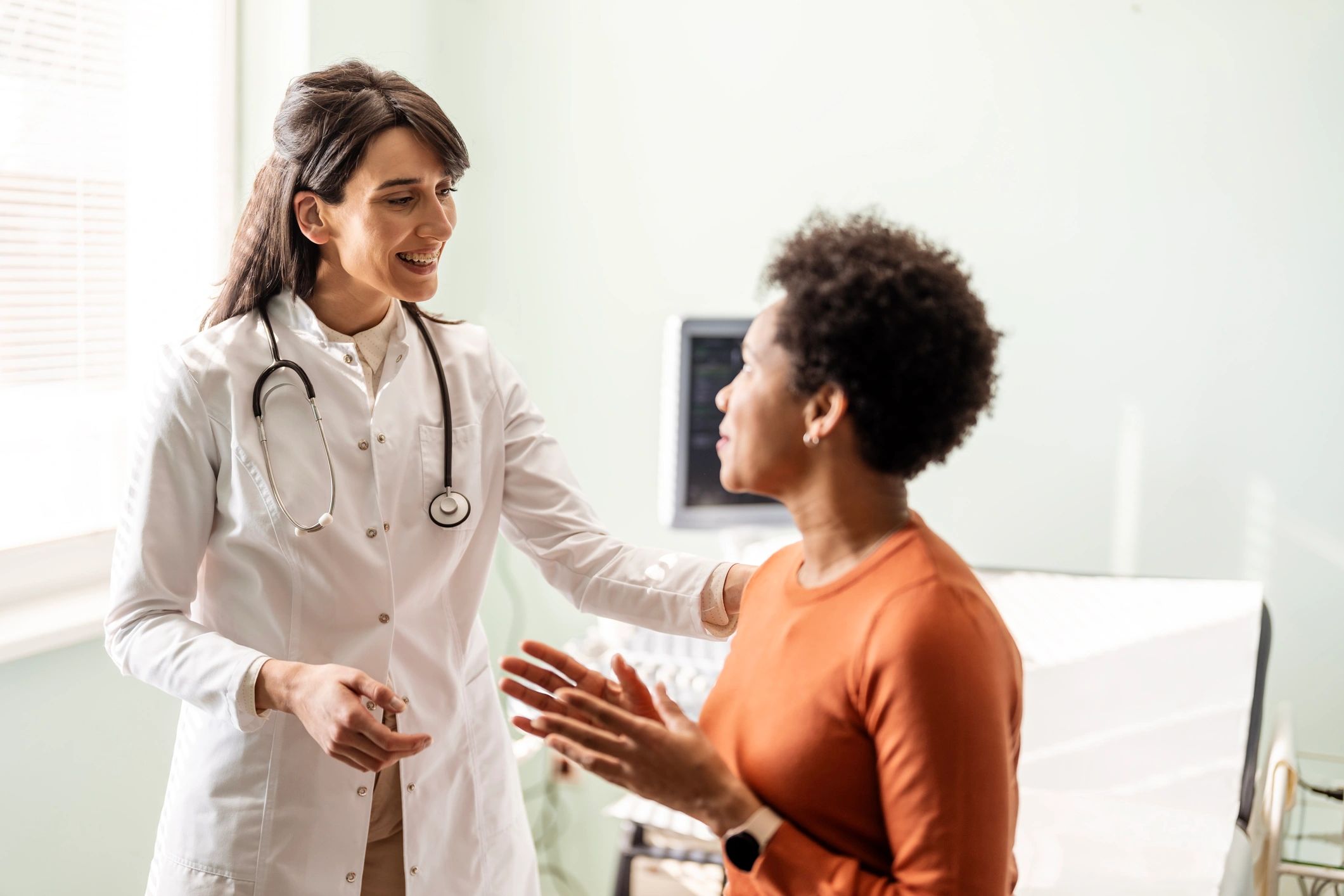 Healthcare professional giving guidance to a patient