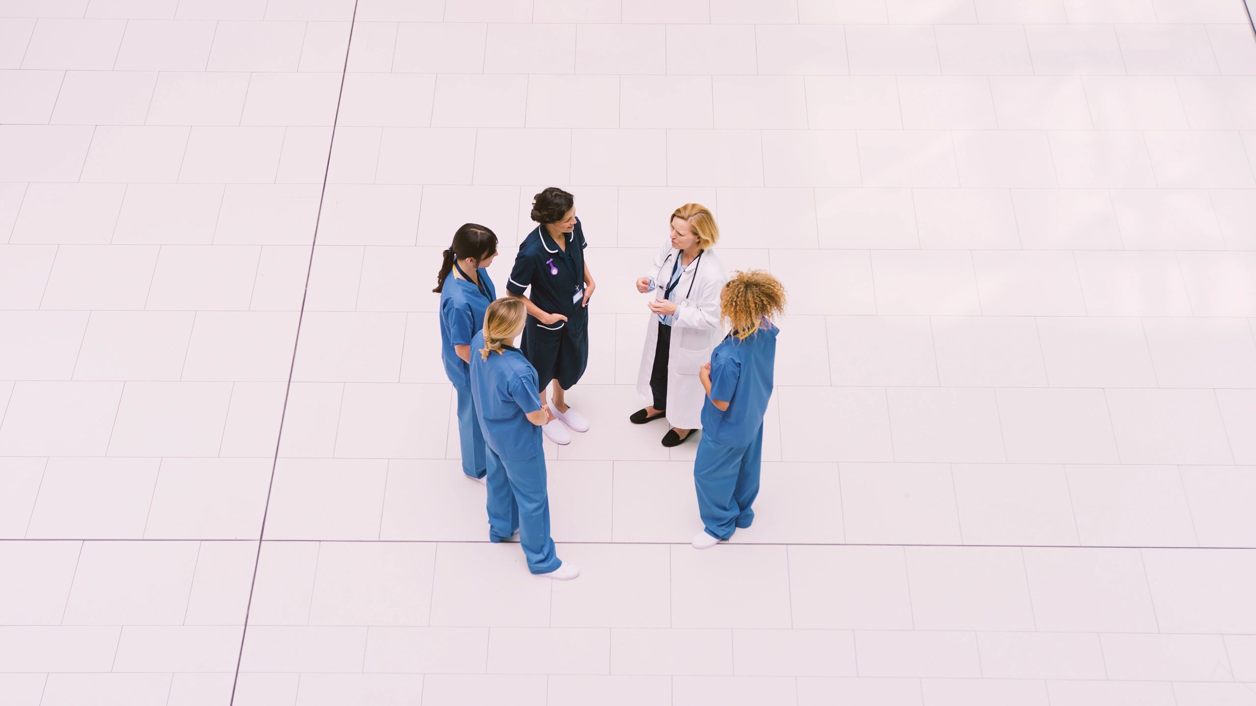 Healthcare staff meeting in a modern medical setting