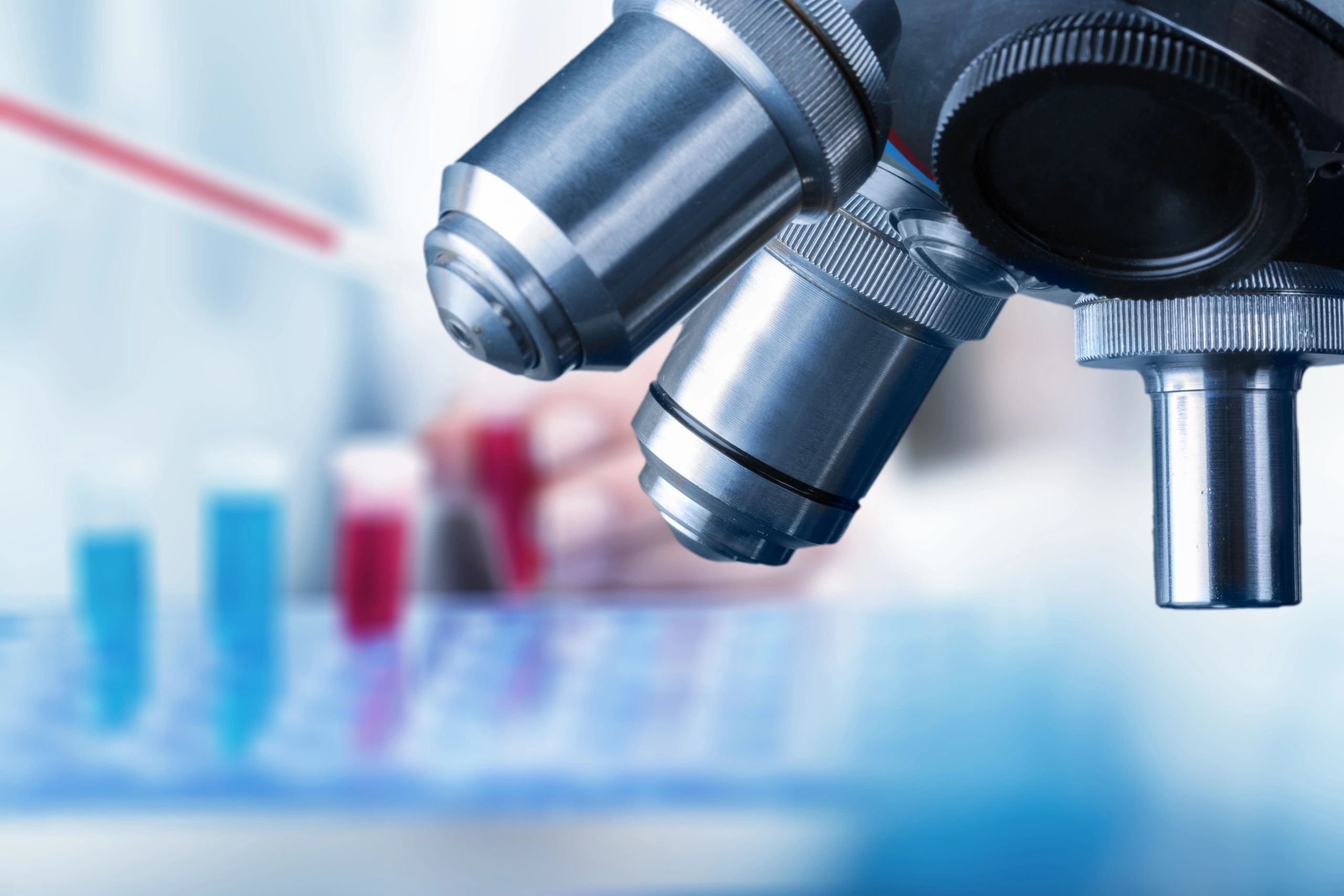 Clinical laboratory equipment and scientist at work